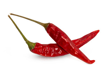Dried red hot peppers isolated on white.