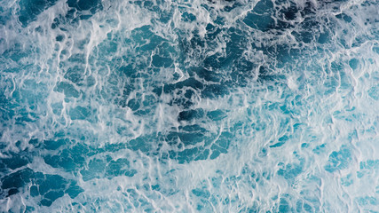 Blue foam ocean surface, water texture