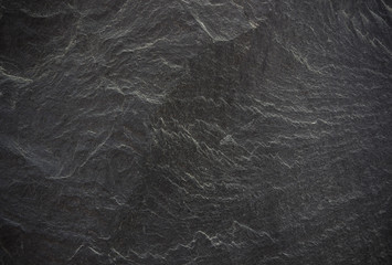 Dark grey black slate background or texture.