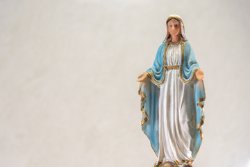 Image of Catholic saints where Our Lady of Graces appears on a light background