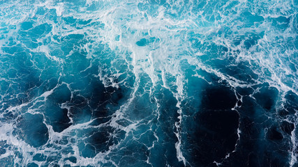 Abstraction of sea foam in the ocean. Dark water, storm waves
