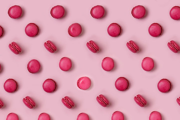 pink macaroons pattern on pink background 