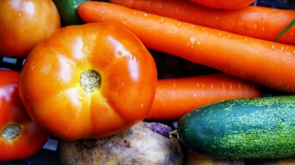 Image of mixed vegetable such as tomatoes and carrots.