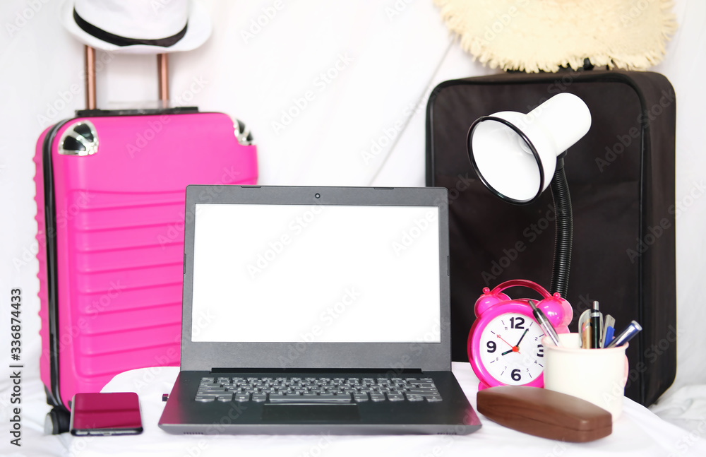 Poster home office table of laptop computer and blank paper background and copy space