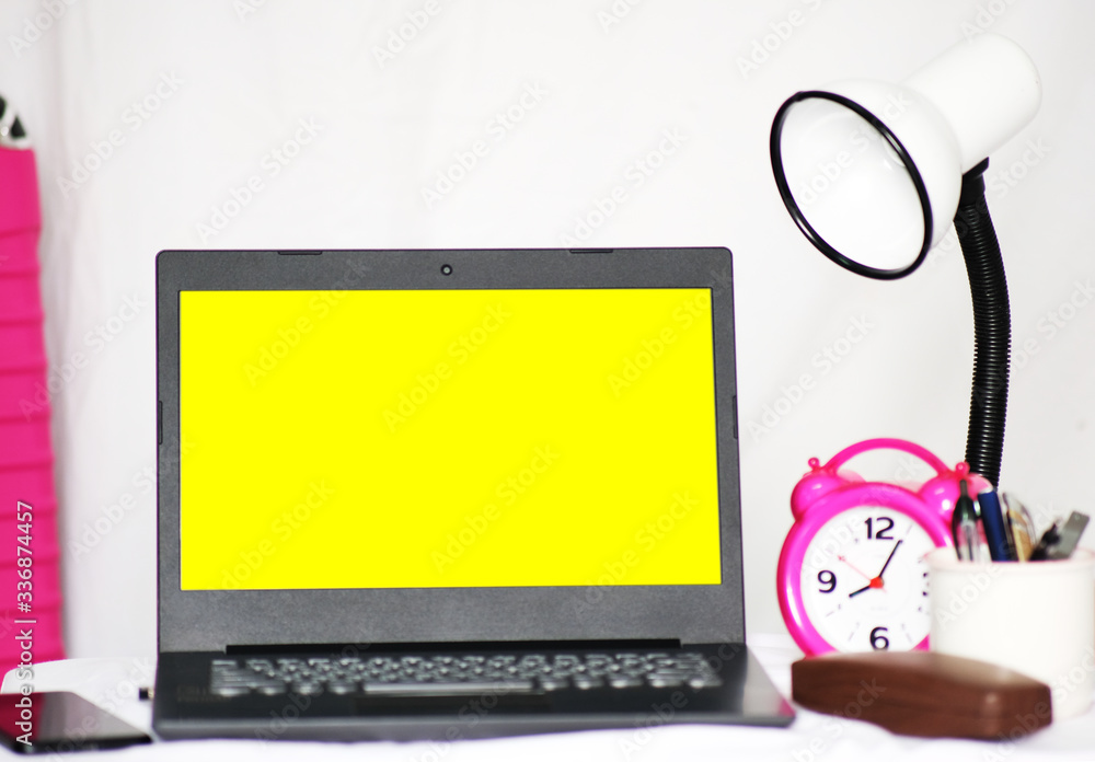 Poster home office table of laptop computer and blank paper background and copy space