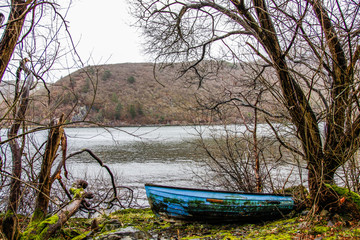 Fototapeta premium old boat on the river