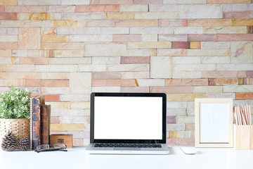 Fototapeta premium Office desk Workspace stuff with notepad, laptop and coffee cup mouse notepad shot. 