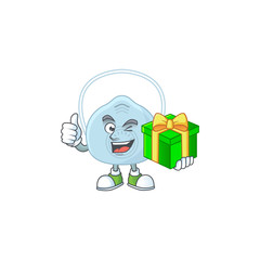 Obraz premium Smiley breathing mask cartoon character holding a gift box