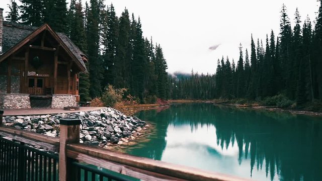beautiful cabin by the lake in Canadian mountains