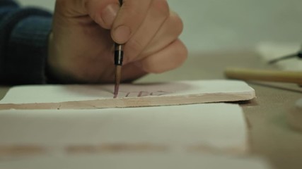 ceramic workshop. making ceramic tiles