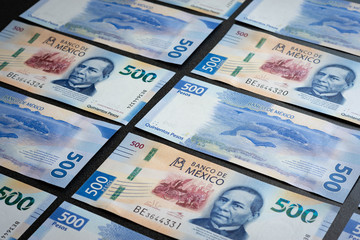 Mexican 500 pesos pile of blue bucks arranged perfect left - obrazy, fototapety, plakaty