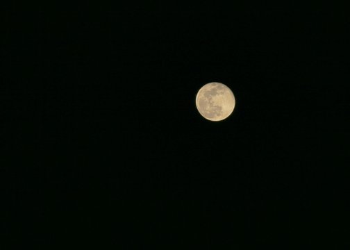 full moon over the black sky