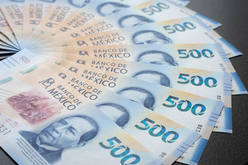 Mexican 500 pesos pile of blue bucks together