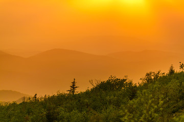 Beautiful landscape. Bright colorful sunset opening from the top of the mountain in the summer. Storm clouds during sunset. relax