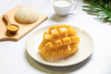 Thai sweet sticky rice with mango. Thai style tropical dessert, glutinous rice eat with mango.