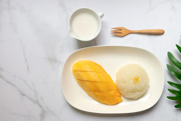 Thai sweet sticky rice with mango. Thai style tropical dessert, glutinous rice eat with mango. Copy space for text.