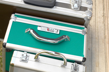 three locked briefcases