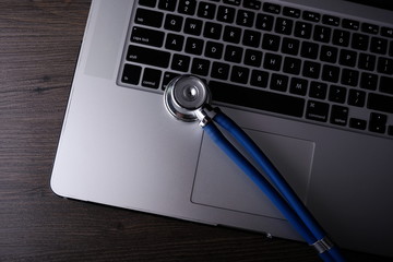 Stethoscope on laptop. Medical conceptual