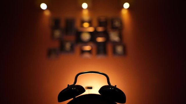 Alarm bell ringing with background lights in 4k