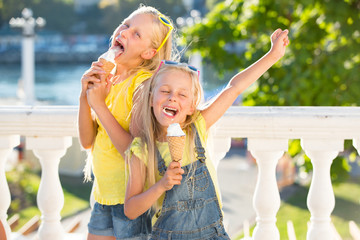 Kids eating ice cream outdoors
