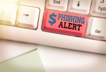 Writing note showing Phishing Alert. Business concept for aware to fraudulent attempt to obtain...