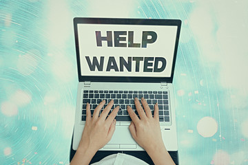 Conceptual hand writing showing Help Wanted. Concept meaning An ad in the paper an employer places...