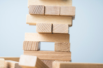 wooden blocks on a blue background, concept, selective focus, tinted image