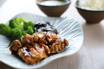 japanese food , Chicken teriyoki with rice on wood background