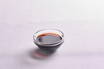 soy sauce with a bowl on the table