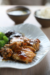 japanese food , Chicken teriyoki with rice on wood background
