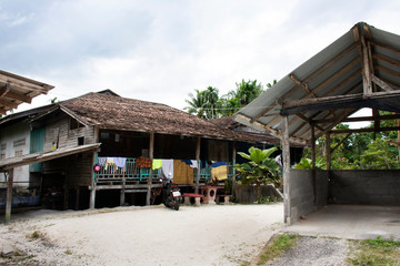 Old local wooden house of thai muslim people at Bacho Tak Bai village on August 16, 2019 in Narathiwat, Thailand
