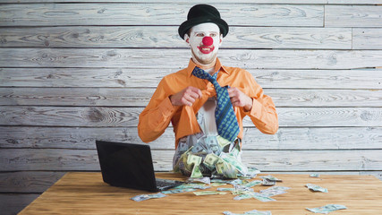 clown businessman with money in his bosom. Concept on big boss with big money.