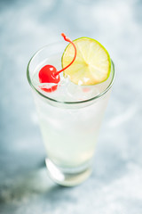 Rum collins cocktail (variation of traditional Tom collins). Selective focus. Shallow depth of field.