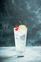 Rum collins cocktail (variation of traditional Tom collins). Selective focus. Shallow depth of field.