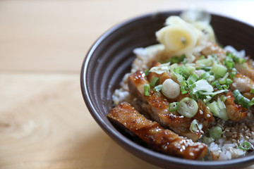 japanese food , Chicken teriyoki with rice on wood background