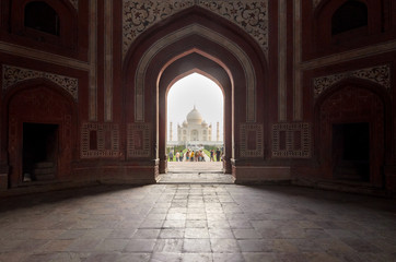 Perspective of the Taj Mahal main mausoleum and gardens from the gate, in Agra, India