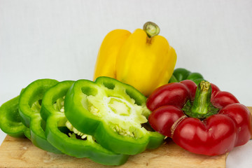 chopped peppers on a board