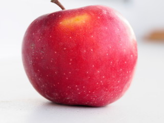 red Apple with a twig, macro