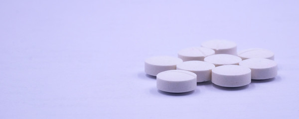 tablets medicine, White pills lie on a blue surface, Conceptual Medicine, drug.