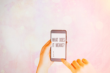 Writing note showing What Does It Means Question. Business concept for asking meaning something...