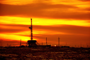 The drilling rig during sunset