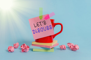 Conceptual hand writing showing Let Discuss. Concept meaning asking someone to talk about something...