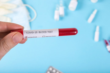 Fototapeta premium Positive COVID-19 test and laboratory sample of blood testing for diagnosis new Corona virus infection(novel corona virus disease 2019). Pandemic infectious concept