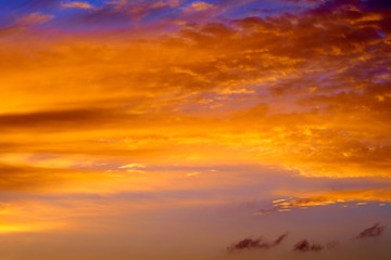 Incredibly colorful sunset on the tropical beach. Abstract nature background.
