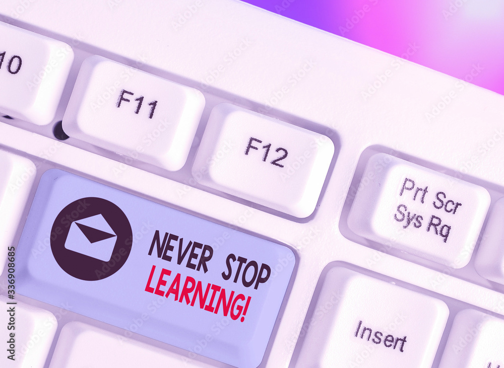 Poster handwriting text never stop learning. conceptual photo keep on studying gaining new knowledge or mat