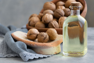 Fototapeta na wymiar Biological walnut oil, healthy eating ingredient, vegan and vegetarian food.