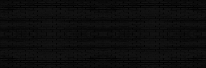Black brick wall texture, brickwork for background design. wide panorama picture.
