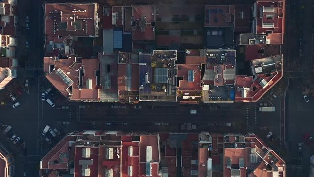 AERIAL: Barcelona Overhead Drone Shot of Typical City Blocks in Beautiful Sunlight with Urban Traffic 