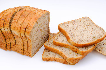 Fresh homemade baked bread and sliced bread isoalted on white background
