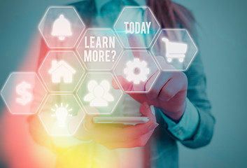 Conceptual hand writing showing Learn More question. Concept meaning gain knowledge or skill studying practicing